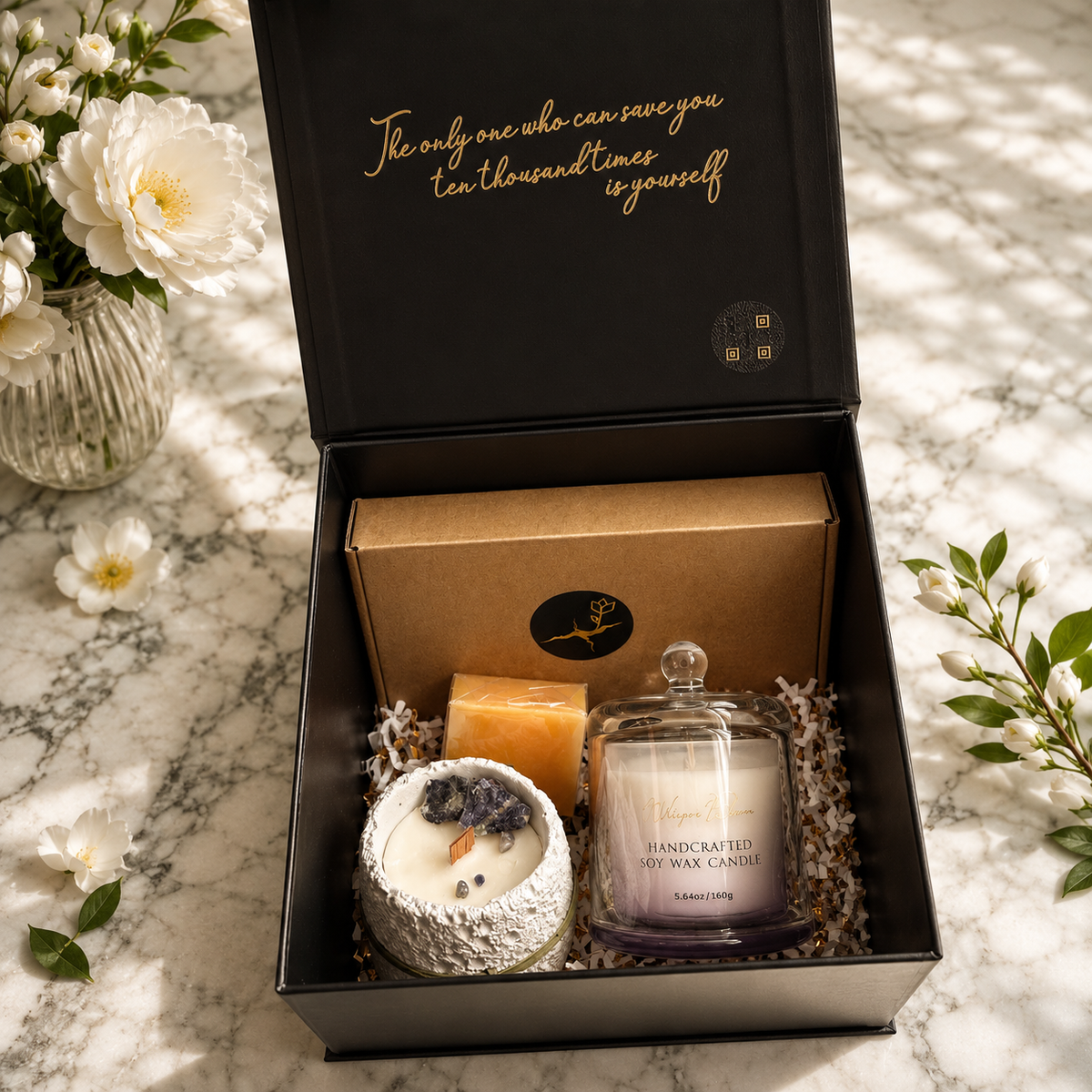 The Architecture of Stillness gift set arranged inside an open black presentation box