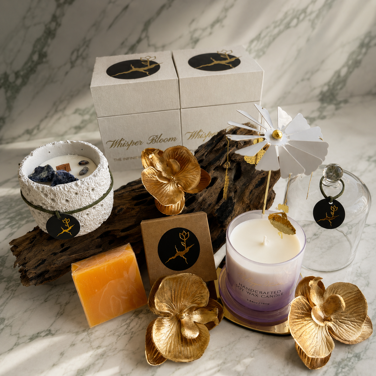 The Architecture of Stillness gift set showing carousel, purple cloche candle, stone bowl candle, and orange soap