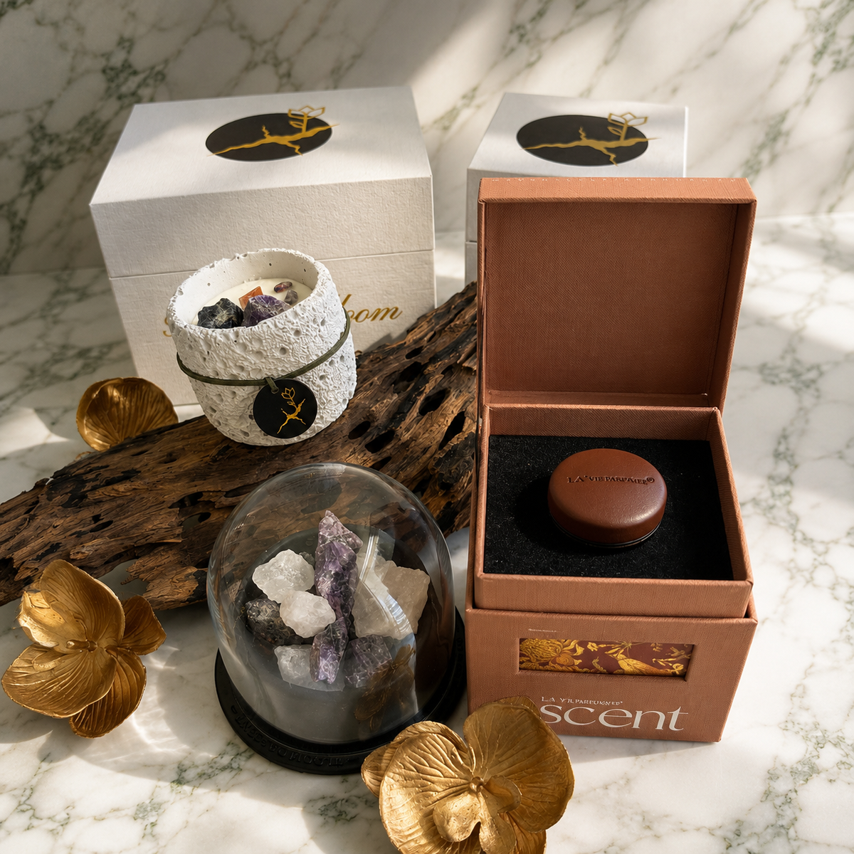 The Sovereign Ascent gift set with raw crystal diffuser, stone bowl candle, and round car diffuser