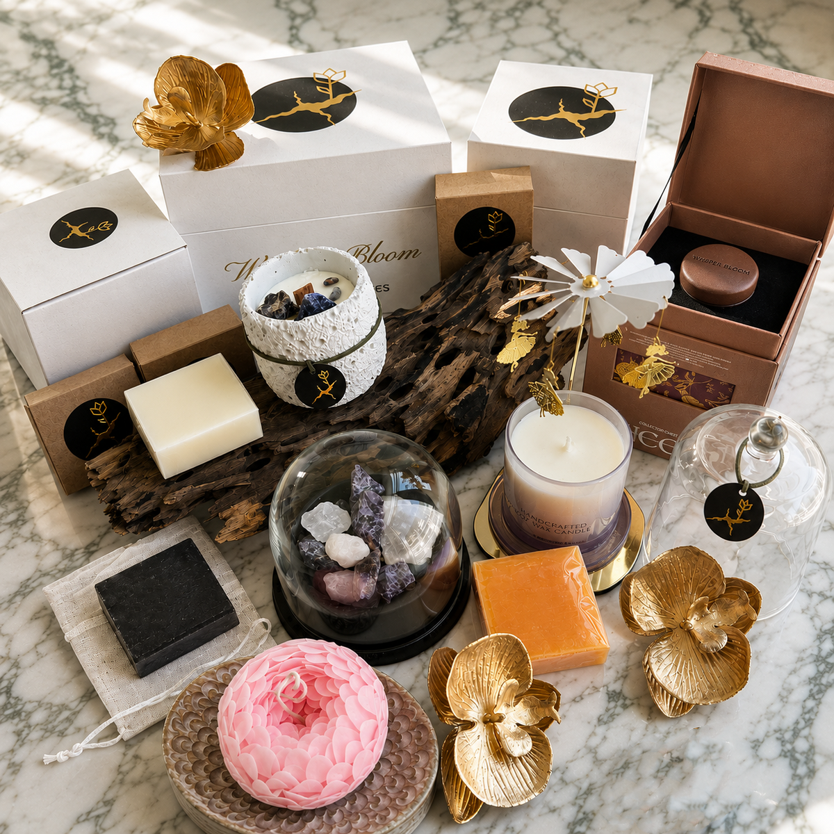 The Archive of Triumph gift set arranged on a light veined surface with candles, diffusers, soaps, and carousel